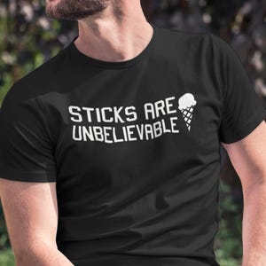 Funny Hockey T-Shirt: Sticks Are Unbelievable - Gift for Hockey Fans