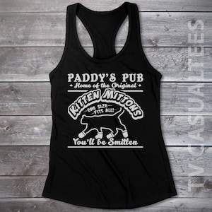 May include: Black tank top with a white graphic of a cat wearing mittens. The graphic says "Paddy's Pub, Home of the Original, Kitten Mittons, One Size Fits All! You'll be Smitten."