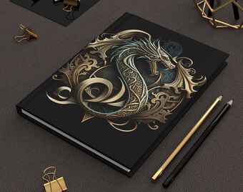 May include: A black notebook with a gold and blue dragon design. The dragon is surrounded by intricate floral patterns.