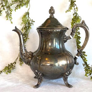 Vintage utsmyckad silverpläterad tekanna handduk silver vintage tebjudningsservis