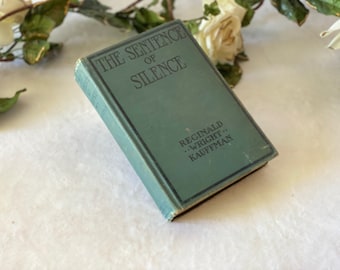 Primera edición antigua de 1912 de El Sentencia del Silencio, libro de Reginald Wright Kauffman, tapa dura vintage.