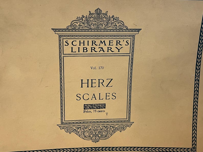 May include: A vintage book cover from Schirmer's Library, Vol. 170, featuring the title "HERZ SCALES" in bold, black lettering. The cover has an ornate frame and decorative elements, with the text "SCHIRMER'S LIBRARY" at the top.