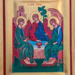 Icono ortodoxo de la Santísima Trinidad, estilo bizantino, fondo de pan de oro, arte religioso hecho a mano en Grecia.