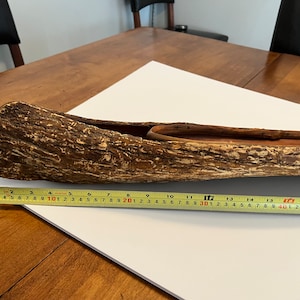 Vintage Handmade Bark Canoe 32” in length. Very rare canoe model. Hang on a wall or display on a shelf. Similar to a birch bark canoe.