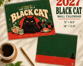 May include: A 2027 Black Cat wall calendar featuring a black cat illustration with ramen, coffee, wine, and sushi. The cover text reads A YEAR IN THE LIFE OF A BLACK CAT. Dimensions listed are 27.9 cm by 21.6 cm and 35.6 cm by 29.2 cm.