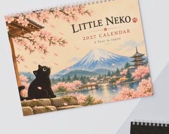 May include: A spiral-bound 2027 wall calendar titled Little Neko, A Year in Japan. The cover features a black cat sitting on a stone wall, looking at a landscape with Mount Fuji, cherry blossoms, a pagoda, and a bridge over water.
