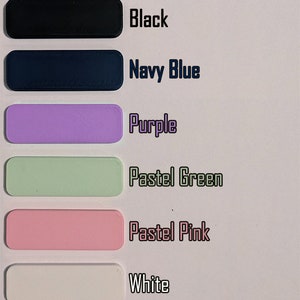 May include: Six color swatches of paint samples. The colors are black, navy blue, purple, pastel green, pastel pink, and white.