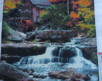 Waterfall with cabin