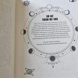 May include: An open book page with text and illustrations. The text "AN WE HARM NO-ONE" is within a circular design with moon phases, stars, and geometric shapes. The page is cream-coloured with black ink.