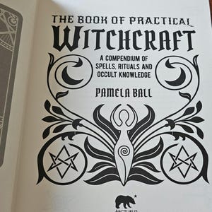 May include: An open book titled "THE BOOK OF PRACTICAL WITCHCRAFT" with black text and decorative illustrations. The book cover features the author's name, Pamela Ball, and the publisher's logo. The book's subtitle reads "A COMPENDIUM OF SPELLS, RITUALS AND OCCULT KNOWLEDGE."