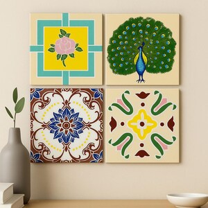 May include: Four decorative ceramic tiles with colorful floral and peacock designs. One tile features a pink rose in a yellow square, another a peacock with a fanned tail. The other two tiles have intricate patterns in blue, brown, and yellow.