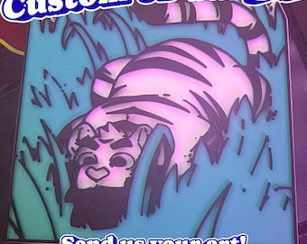 May include: A square 3D badge featuring a white tiger with black stripes lying in blue grass. The text at the top reads Custom 3D badges and the text at the bottom reads Send us your art! We will turn it into a badge! The design has layered elements.