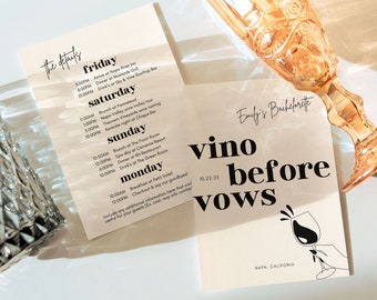 May include: A beige card with black text that reads "Emily's Bachelorette vino before vows 10.22.25 NAPA, CALIFORNIA". A black and white illustration of a hand holding a wine glass with a wine splash is in the bottom right corner of the card.