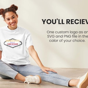May include: A white t-shirt with a black and yellow graphic of the Las Vegas sign that says "Ashley's Fabulous Las Vegas Bachelorette". The text "YOU'LL RECIEVE" is in black text above the image. Below the image is the text "One custom logo as an SVG and PNG file in the color of your choice."