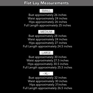 May include: A chart showing flat lay measurements for clothing in sizes small, medium, large, and extra large. The measurements are given in inches for bust, waist, hips, and full length.