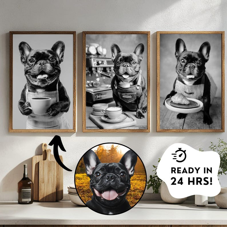 May include: Set of three framed black and white prints featuring a French Bulldog in various cafe settings. One print shows the dog holding a coffee cup, another with a coffee machine, and the last with a croissant. The prints have wooden frames.