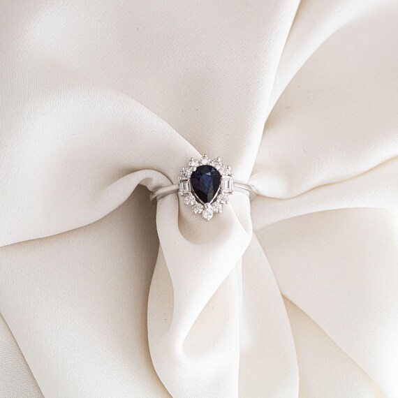 Pear Sapphire Halo Ring: 18K White Gold Baguette Diamond Band