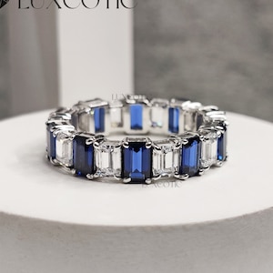 Emerald Cut Simulated Blue Sapphire Ring: CZ Sterling Silver Eternity Band