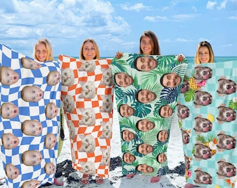 May include: Four beach towels with different designs. One towel has a blue and white checkered pattern with a repeated image of a person's face. Another towel has an orange and white checkered pattern with a repeated image of a cat's face. A third towel has a green background with a repeated image of a person's face and tropical leaves. The last towel has a light blue background with a repeated image of a dog's face and tropical elements.