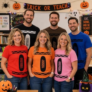 May include: A group of six people wearing colourful t-shirts designed to look like crayons. Each shirt features a black crayon-shaped graphic with a name printed inside, including Henry, Jack, Peter, Sophia, Anna, and Sophia, paired with blue jeans.