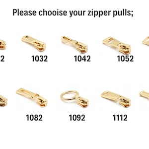 May include: A selection of gold-colored zipper pulls in various designs. The image includes ten different styles, each labeled with a unique four-digit number. The text at the top reads, "Please choose your zipper pulls;"
