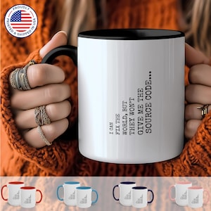 May include: White coffee mug with a black rim and handle. The mug has a black text saying "I can fix the world, but they won't give me the source code..."