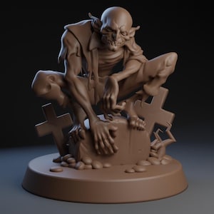 May include: A brown clay sculpture of a monstrous creature with sharp teeth and claws, sitting on a tombstone with a cross behind it.