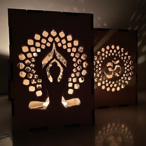 Yoga Laterne mit Yoga Lehrerin Silhouette, Om Zeichen im Hintergrund