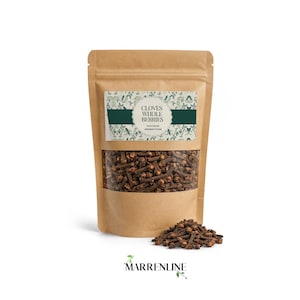 May include: A brown kraft paper stand-up pouch containing whole dried cloves. The label features a botanical pattern, a dark green horizontal band, and the text CLOVES WHOLE BERRIES SYZYGIUM AROMATICUM. A small pile of loose cloves sits in front.