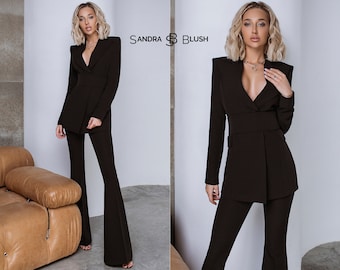 Black 2-Piece Formal Pantsuit For Women With Elongated Deep V Jacket, Wide Belt And High Waisted Flared Pants. Rehearsal Dinner Suit