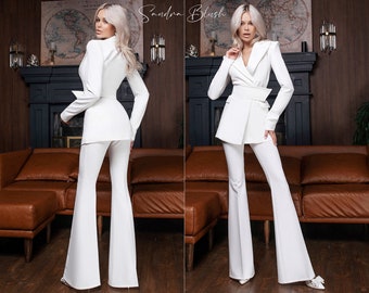 White 2-Piece Formal Pantsuit For Women With Elongated Deep V Jacket, Wide Belt And High Waisted Flared Pants. Bridal, Rehearsal Dinner Suit
