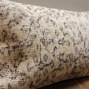 Turkish kilim pillow cover, beige and taupe tones with faded tribal patterns, rustic minimalist decor, unique handmade boho accent cushion.
