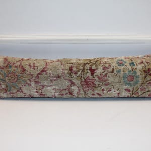 Elegant, Warm, Unique
A one-of-a-kind lumbar pillow with soft artistic details.