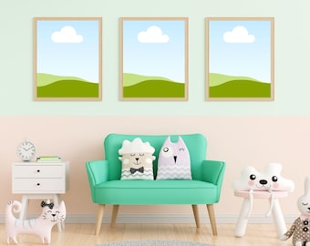 May include: Three framed landscape prints with a blue sky, white cloud, and green hills hang above a teal sofa with decorative pillows. A white nightstand, cat figurine, and other decorative items complete the room.
