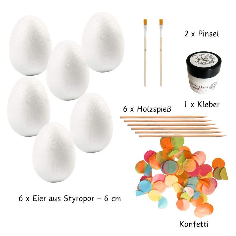 May include: A craft kit featuring six white Styrofoam eggs, each 6 cm tall, two paintbrushes, glue, six wooden skewers, and colourful confetti. The kit also includes a small jar of varnish.