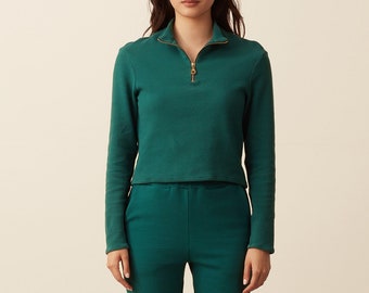 Half Zip Top - 100% Organic Cotton - Emerald. Warm pull over, textured sustainable material, long sleeves, relaxed boxy fit with gold zip