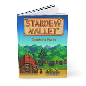 May include: A book cover with a pixelated illustration of a farm scene from the video game Stardew Valley. The cover features a wooden sign with the text "Stardew Valley" and the words "Jessica's Farm" below the sign.
