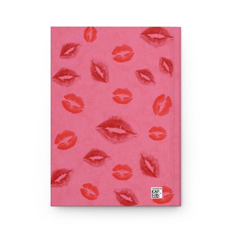 May include: Pink notebook cover with a repeating pattern of red lipstick kiss marks.