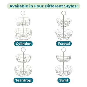 May include: Four two-tiered metal wire baskets with a central handle, labeled Cylinder, Fractal, Teardrop, and Swirl. Each stand features a silver-toned finish and a distinct wire pattern for the baskets, arranged in a grid with the text Available in Four Different Styles! at the top.