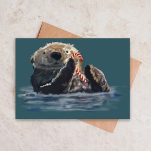Linda nutria bastón de caramelo mar río animal vida silvestre feliz tarjeta de Navidad felices fiestas ilustración pintura pequeño artista en blanco Andrea Lebel