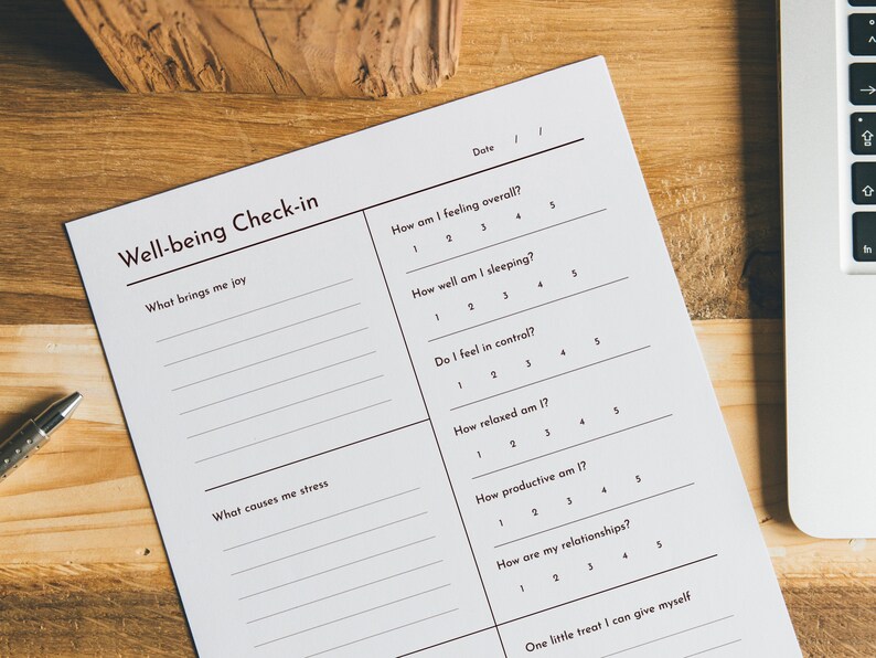 May include: A printable well-being check-in sheet with questions about sleep, relaxation, productivity, relationships, and joy. The sheet includes a space for the date and a section for a personal treat.