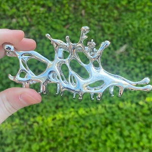 edgy metal silver claw clip