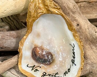 Hand painted real oyster shell, beach combed along Florida’s gulf coast with “No grit, no pearl” painted on it.