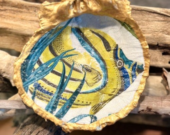 Decoupage yellow, striped, butterfly fish pattern on a hand painted real real spiny oyster shell.