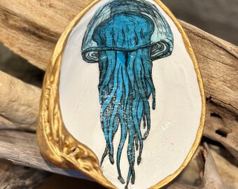 Decoupage blue jellyfish pattern on a hand painted, real clam shell.