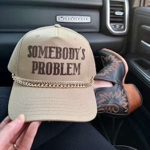 Somebody’s Problem  Khaki trucker Hat