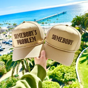 Somebody’s Problem Couple Hats, Khaki trucker Hat