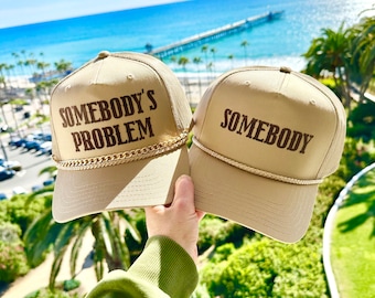 Somebody’s Problem Couple Hats, Khaki trucker Hat