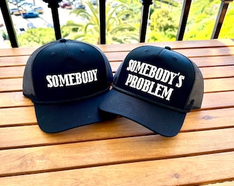 Somebody’s Problem  black  trucker Hat