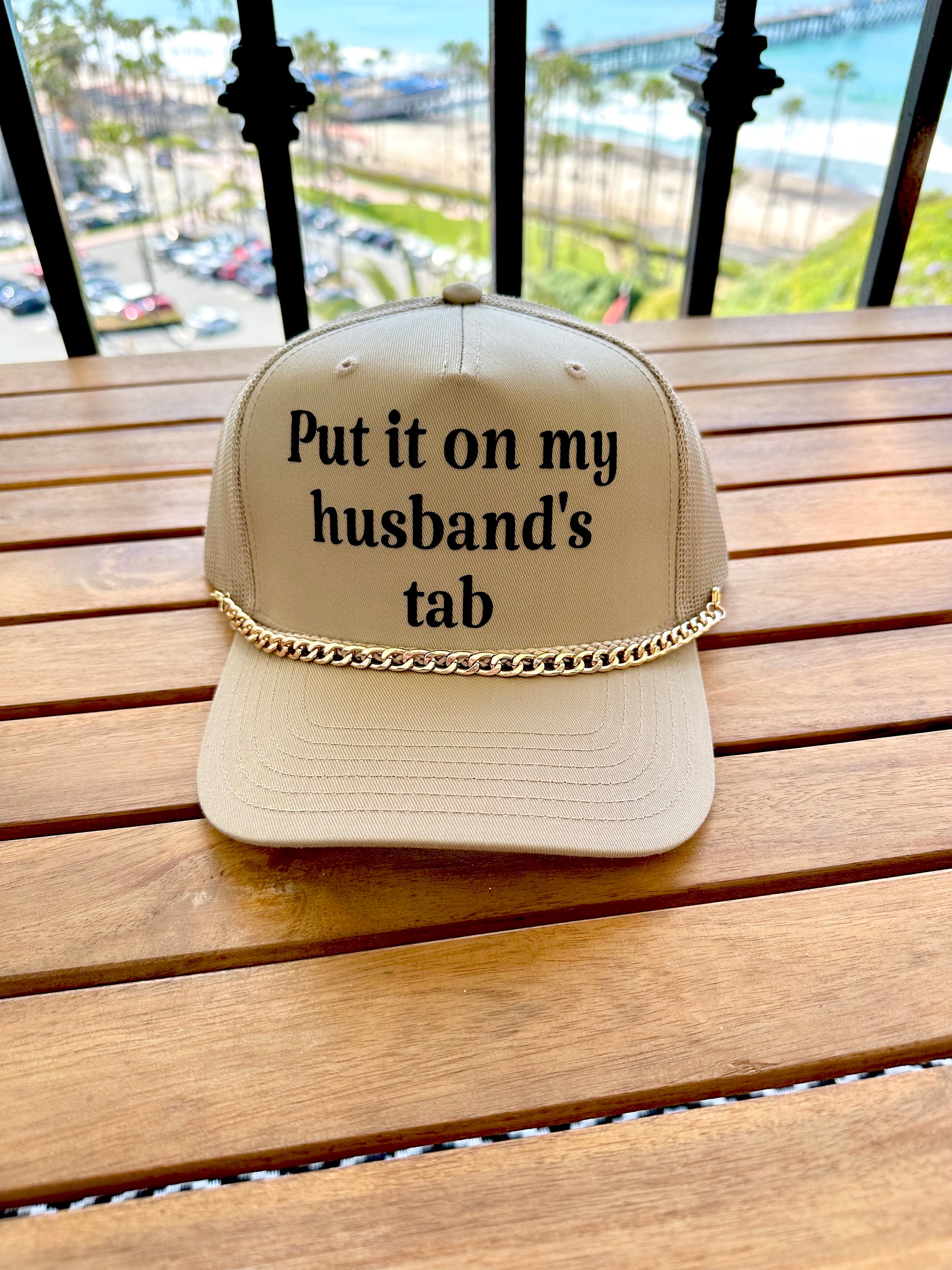 Put It On My Husbands Tab Trucker Hat Put It On My Husbands Tab Trucker Hat